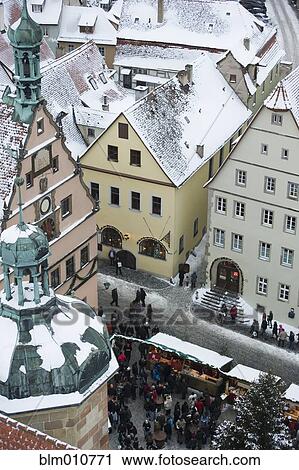 Stock Image - Quaint, snow covered village. Fotosearch