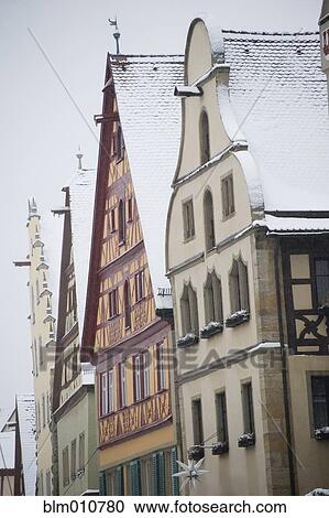 Quaint, snow covered village View Large Photo Image Stock Image - Quaint, snow covered village. Fotosearch