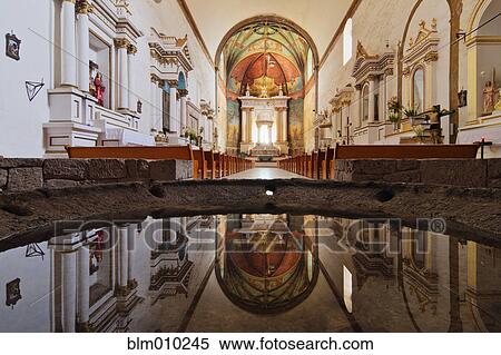 Reflection in font at church of La Natividad View Large Photo Image Stock Photography - Reflection in font at church of La Natividad. Fotosearch
