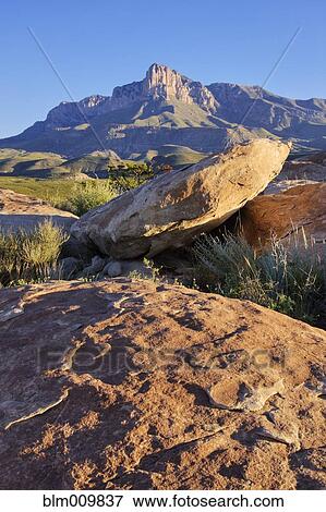 Rocks with El Capitan rock formation in background View Large Photo Image Stock Photo - Rocks with El Capitan rock formation in background. Fotosearch