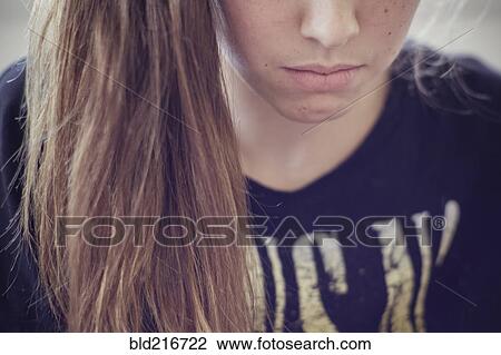 Stock Image - Sad Caucasian teenage girl. Fotosearch