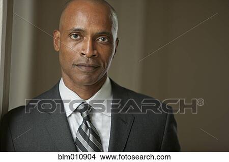 Picture - Serious African American businessman. Fotosearch