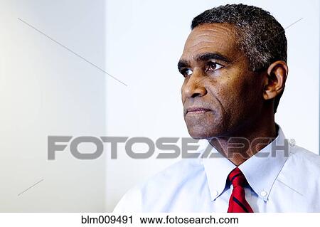 Stock Image - Serious African American businessman. Fotosearch