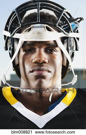 Serious Black football player View Large Photo Image Stock Image - Serious Black football player. Fotosearch