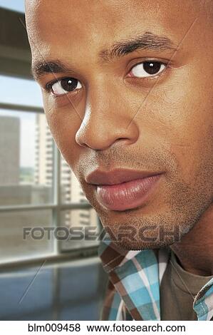 Serious Black man View Large Photo Image Stock Photo - Serious Black man. Fotosearch