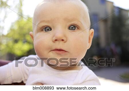 Stock Image - Serious Caucasian baby. Fotosearch