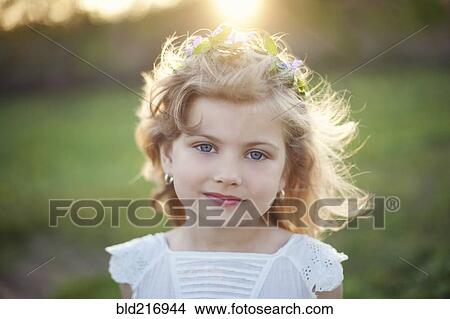 Picture - Serious Caucasian girl outdoors. Fotosearch
