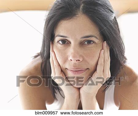 Serious Hispanic woman View Large Photo Image Stock Photo - Serious Hispanic woman. Fotosearch
