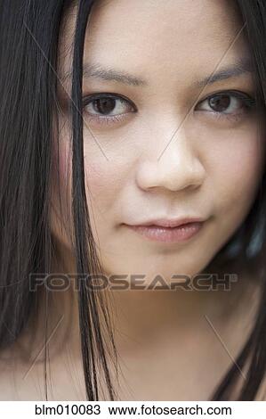 Serious Vietnamese woman View Large Photo Image Stock Image - Serious Vietnamese woman. Fotosearch