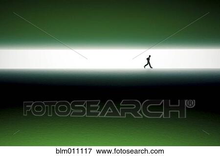 Silhouette of man walking across green surface View Large Photo Image Stock Photo - Silhouette of man walking across green surface. Fotosearch