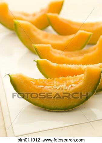 Sliced, fresh cantaloupe View Large Photo Image Stock Image - Sliced, fresh cantaloupe. Fotosearch
