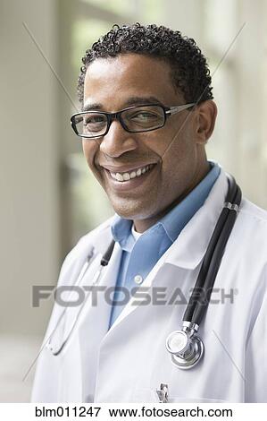 Stock Photo - Smiling African American doctor. Fotosearch