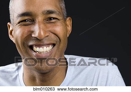 Smiling African American man View Large Photo Image Stock Image - Smiling African American man. Fotosearch