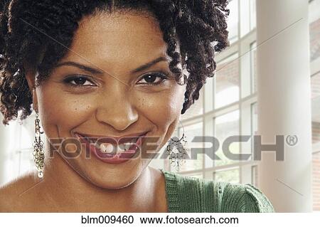 Smiling African American woman View Large Photo Image Stock Image - Smiling African American woman. Fotosearch