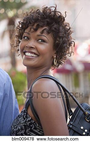 Smiling African American woman View Large Photo Image Stock Photo - Smiling African American woman. Fotosearch