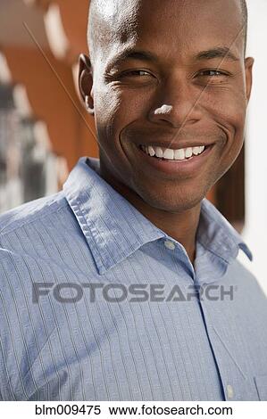 Stock Photography - Smiling Black man. Fotosearch