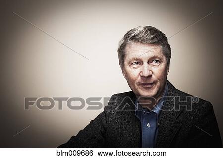 Smiling Caucasian businessman View Large Photo Image Stock Photograph - Smiling Caucasian businessman. Fotosearch