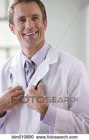 Stock Image - Smiling Caucasian doctor. Fotosearch