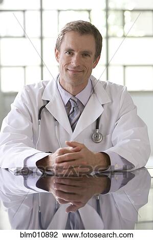 Smiling Caucasian doctor View Large Photo Image Stock Image - Smiling Caucasian doctor. Fotosearch