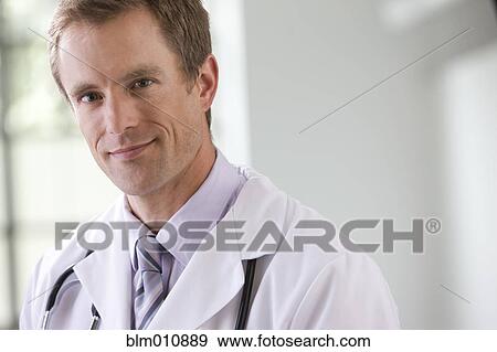 Smiling Caucasian doctor View Large Photo Image Stock Photo - Smiling Caucasian doctor. Fotosearch