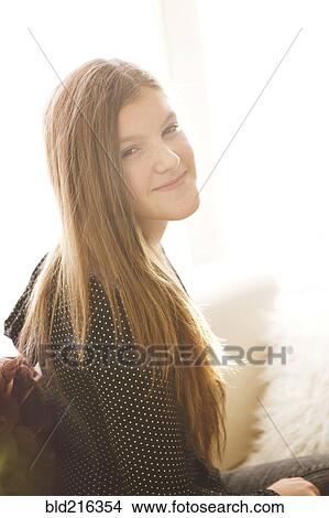 Smiling Caucasian girl with long hair View Large Photo Image Picture - Smiling Caucasian girl with long hair. Fotosearch