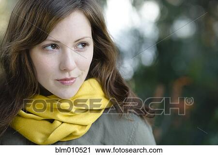 Smiling Caucasian woman outdoors View Large Photo Image Stock Image - Smiling Caucasian woman outdoors. Fotosearch
