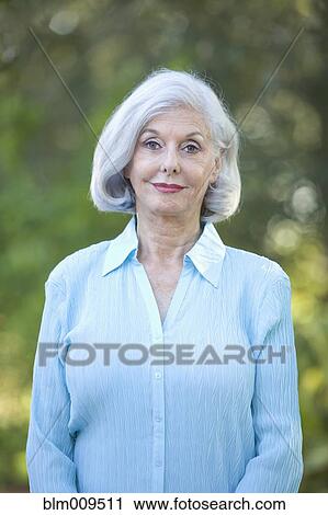 Stock Image - Smiling Caucasian woman. Fotosearch