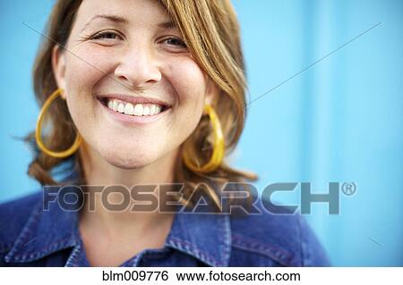 Stock Photograph - Smiling Caucasian woman. Fotosearch