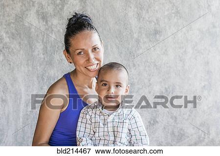 Stock Photo - Smiling Hispanic mother and son. Fotosearch