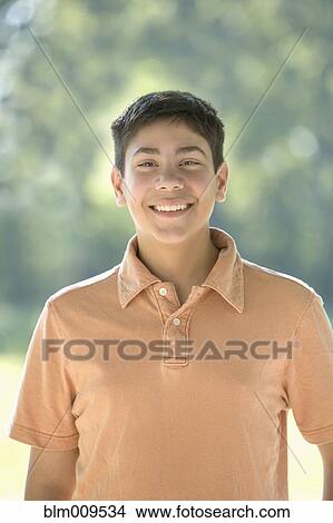 Smiling Hispanic teenage boy View Large Photo Image Picture - Smiling Hispanic teenage boy. Fotosearch