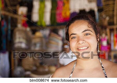 Picture - Smiling Hispanic woman. Fotosearch