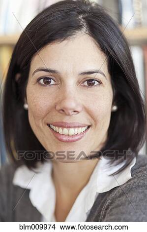 Picture - Smiling Hispanic woman. Fotosearch