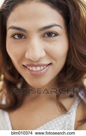 Picture - Smiling Hispanic woman. Fotosearch
