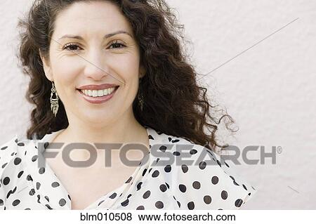 Stock Photo - Smiling Hispanic woman. Fotosearch