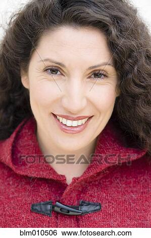 Stock Photograph - Smiling Hispanic woman. Fotosearch