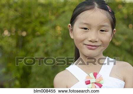 Stock Photography - Smiling mixed race girl. Fotosearch