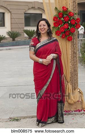 Smiling mixed race woman in Indian clothing View Large Photo Image Stock Photography - Smiling mixed race woman in Indian clothing. Fotosearch