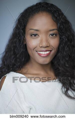 Smiling mixed race woman View Large Photo Image Stock Image - Smiling mixed race woman. Fotosearch