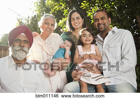 Smiling multi-generation Asian family View Large Photo Image Stock Photograph - Smiling multi-generation Asian family. Fotosearch