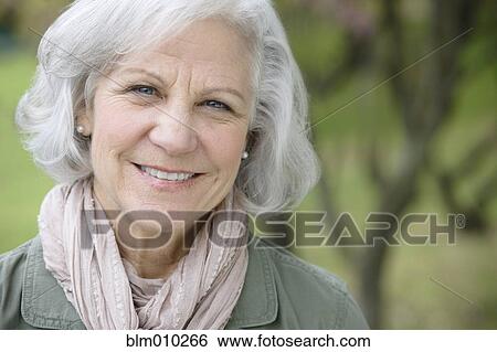 Smiling senior Caucasian woman View Large Photo Image Stock Photograph - Smiling senior Caucasian woman . Fotosearch