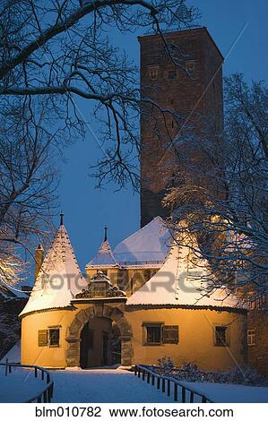 Snow covered village building at night View Large Photo Image Stock Image - Snow covered village building at night. Fotosearch