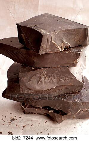 Stack of chopped chocolate bar View Large Photo Image Picture - Stack of chopped chocolate bar. Fotosearch