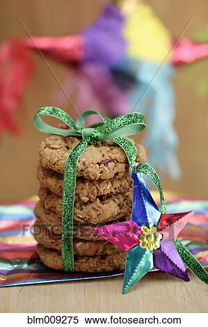 Stack of cookies tied with green ribbon View Large Photo Image Stock Photography - Stack of cookies tied with green ribbon. Fotosearch