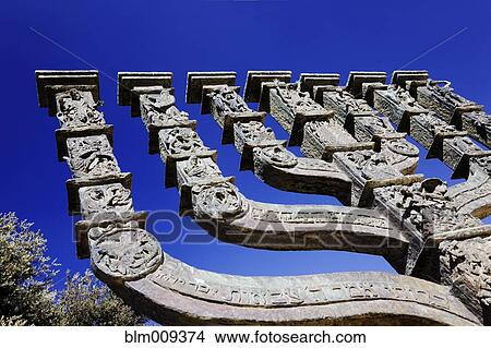 Picture - Stone carving of Menorah. Fotosearch