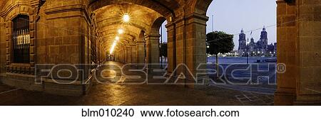 Stock Image - Stone portico at night. Fotosearch