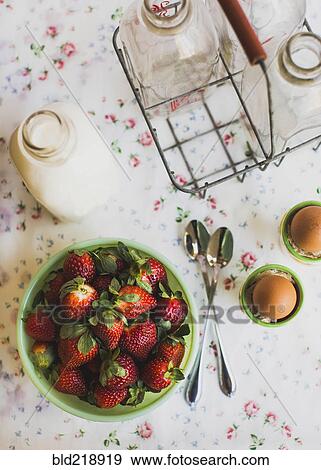 Strawberries, eggs and milk on table View Large Photo Image Stock Photo - Strawberries, eggs and milk on table. Fotosearch