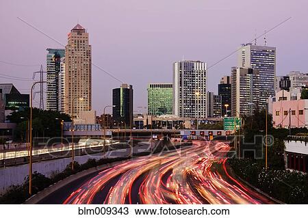 Streaking taillights of city commuter traffic View Large Photo Image Stock Image - Streaking taillights of city commuter traffic. Fotosearch
