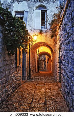 Street lights in alley View Large Photo Image Stock Image - Street lights in alley. Fotosearch