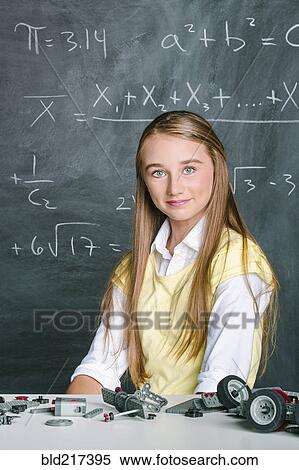 Stock Photography - Student building vehicle in science class. Fotosearch