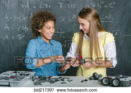 Students building vehicle in science class View Large Photo Image Stock Photo - Students building vehicle in science class. Fotosearch